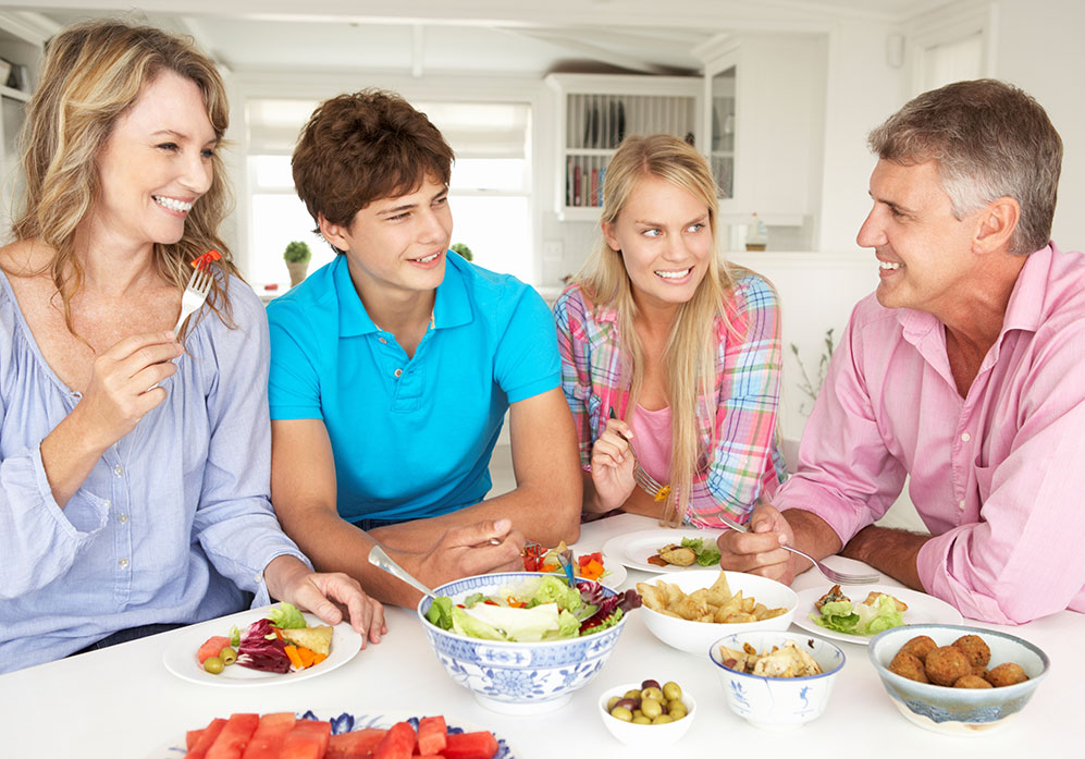 Family having lunch together at a table